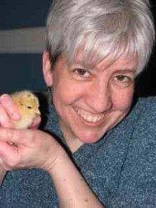 Woman holding yellow chick